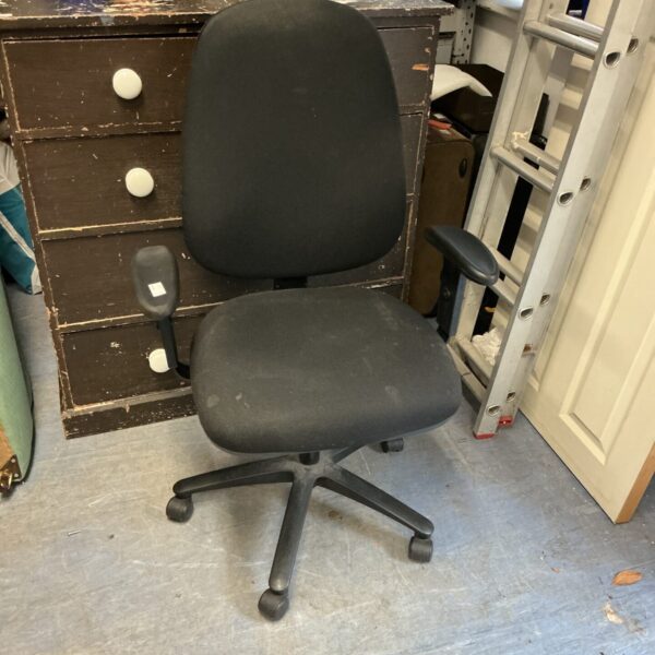 Black office chair on wheels for desk use.
