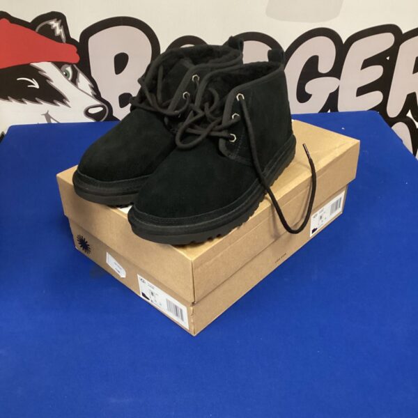 New black size 8 Ugg boots for winter comfort.