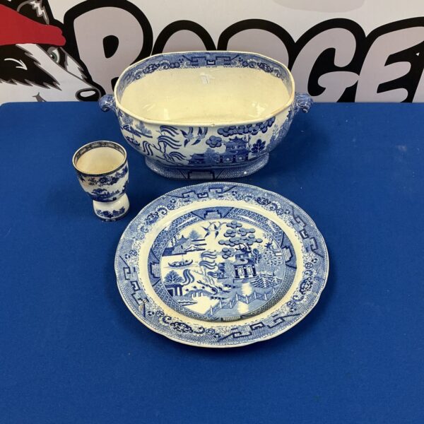 Antique blue and white porcelain bowl with Chinese landscape scenes.