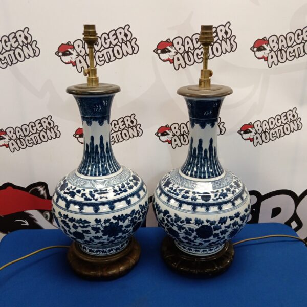 Elegant blue and white porcelain table lamp with floral design.