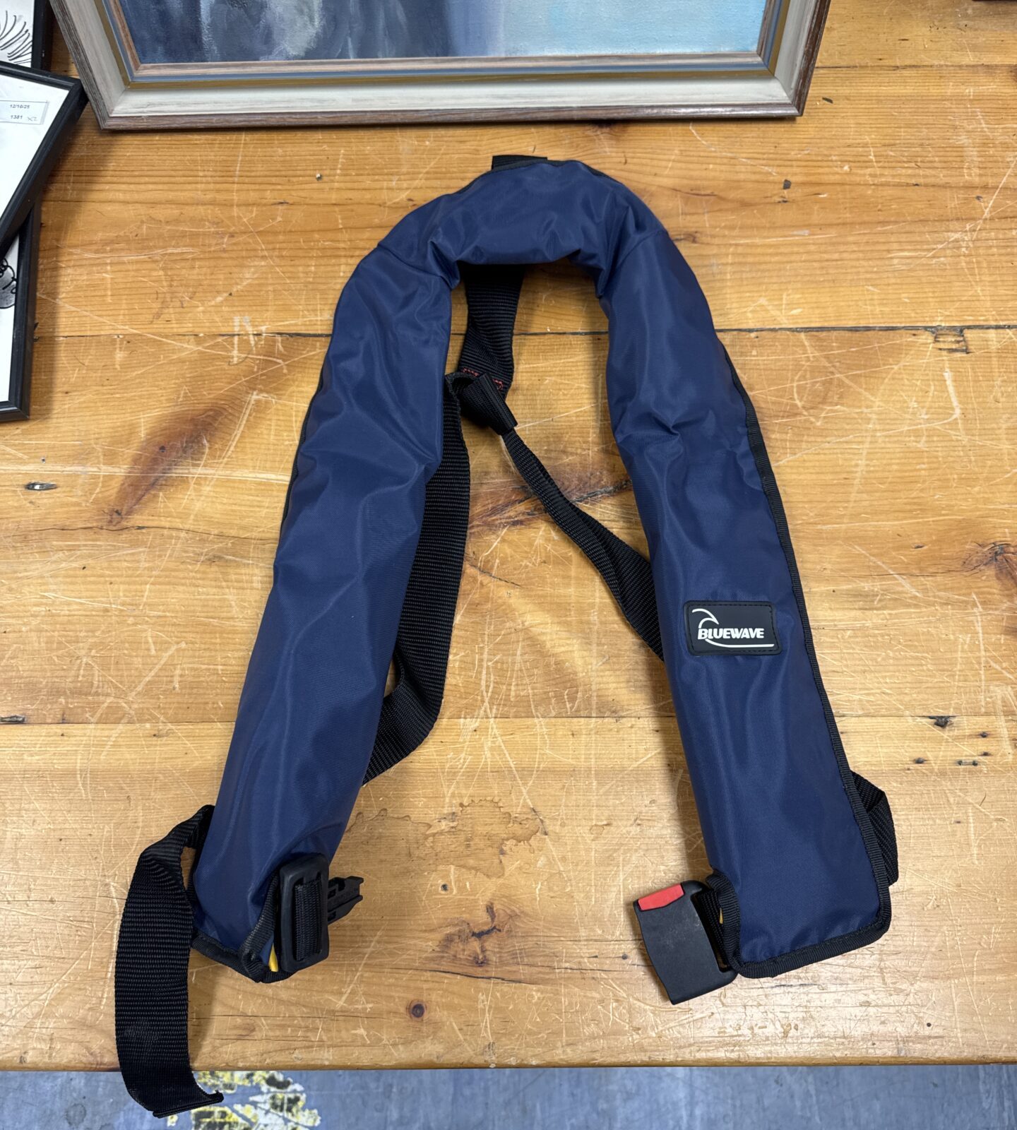 Bluewave inflatable life jacket for boating and water safety.