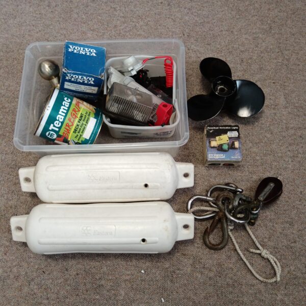 Boating accessories lot including propeller and paint.