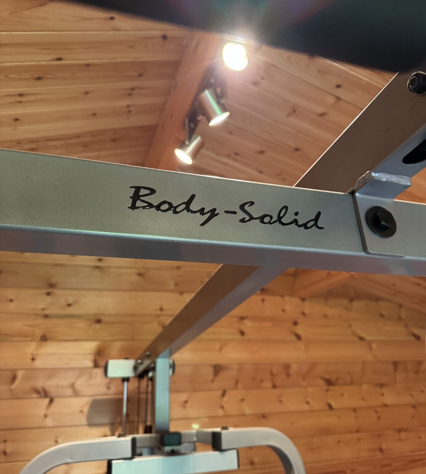 Close-up of the Body Solid logo on the multi gym.