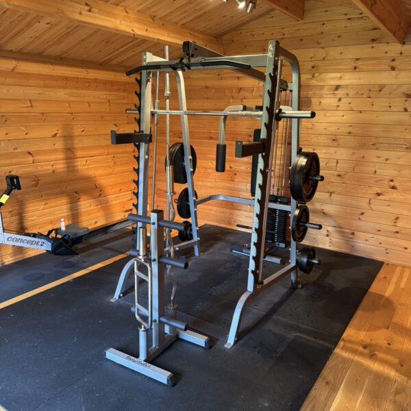 Large Body Solid multi gym in a home gym setting.