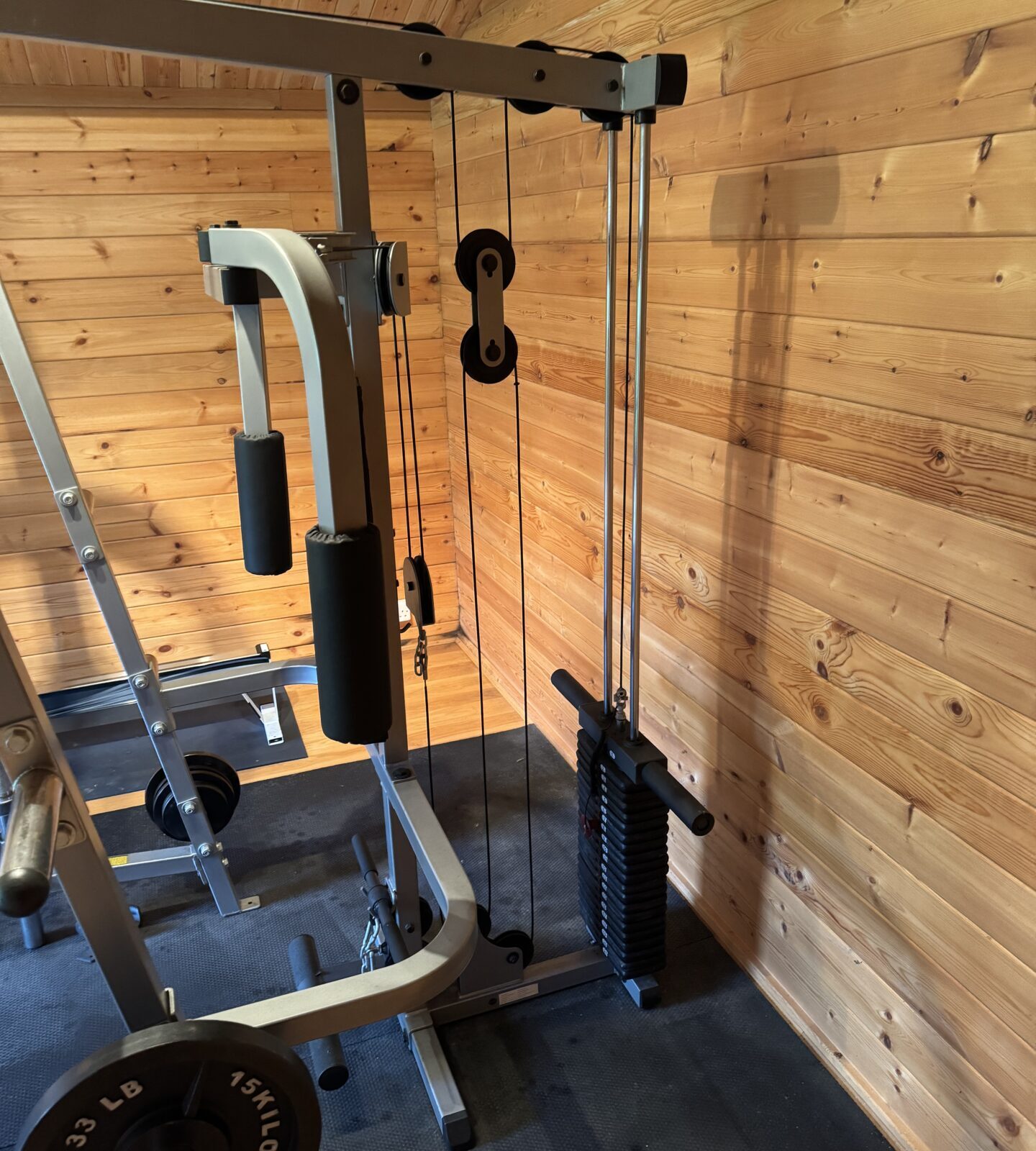 Close-up of the pulley system on the Body Solid multi gym.