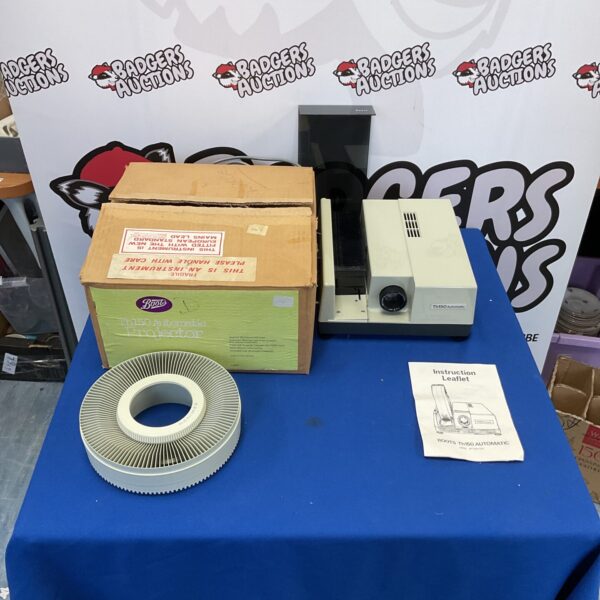 Vintage Boots Th150 slide projector with Hanimex slide library.