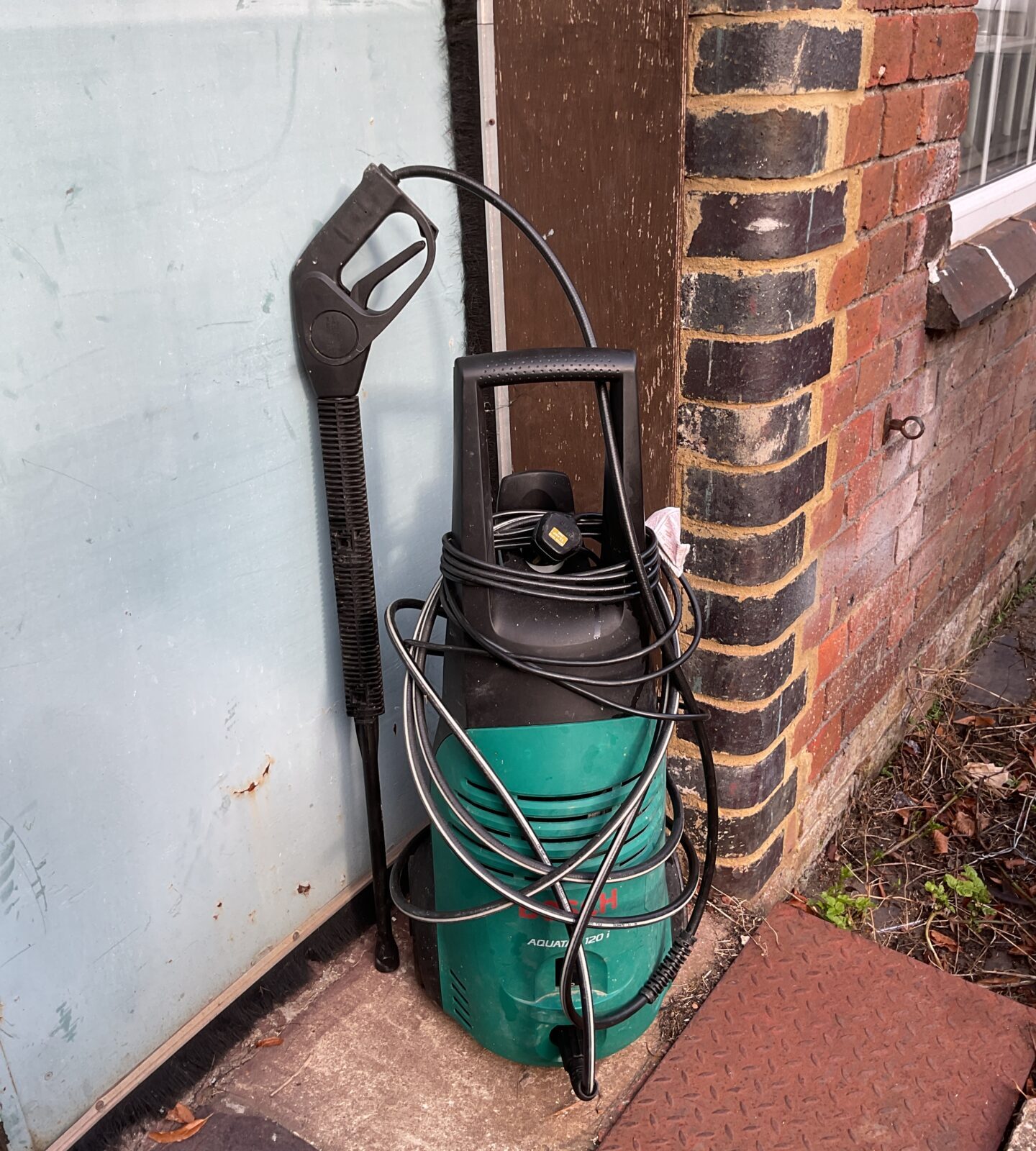 Bosch Aquatek 120 pressure washer for garden and driveway cleaning.