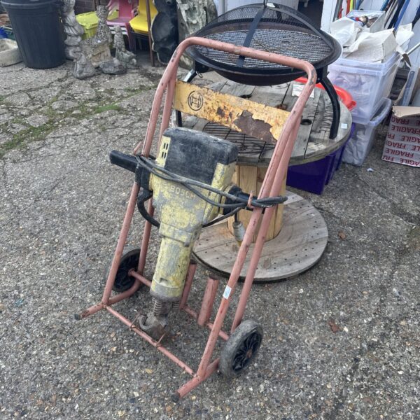 Vintage Bosch Kango drill on trolley, heavy duty power tool.