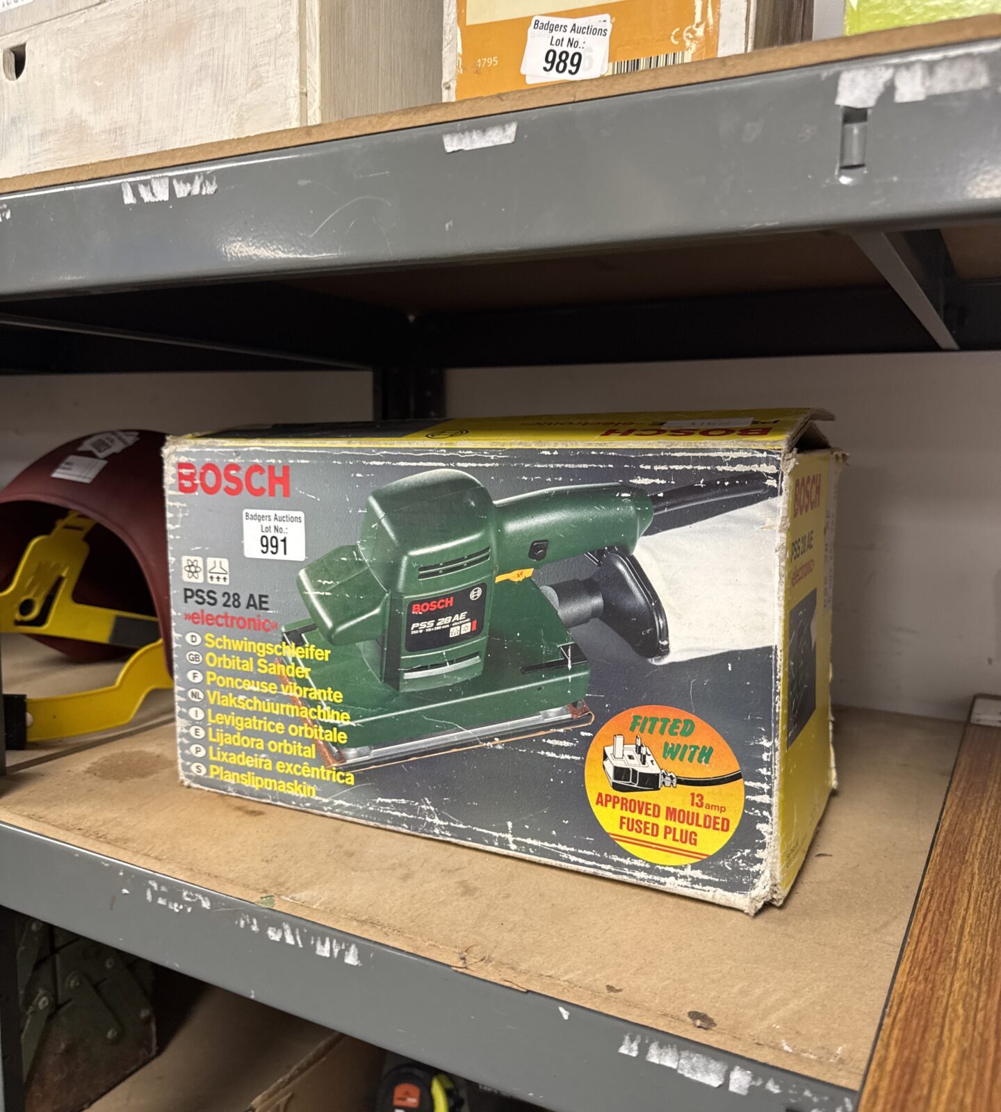 Used Bosch PSS 28 AE electric sander in a lot with other items.
