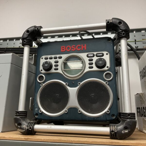 Front view of a rugged Bosch site radio with a display screen.
