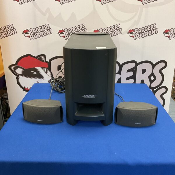 Black Bose Acoustimass module subwoofer for home audio systems.