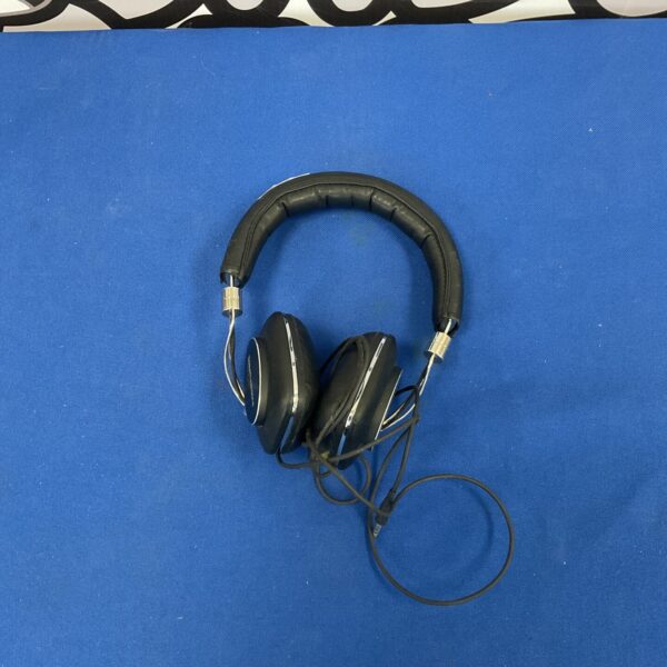 Black Bowers and Wilkins over-ear headphones, vintage audio equipment.