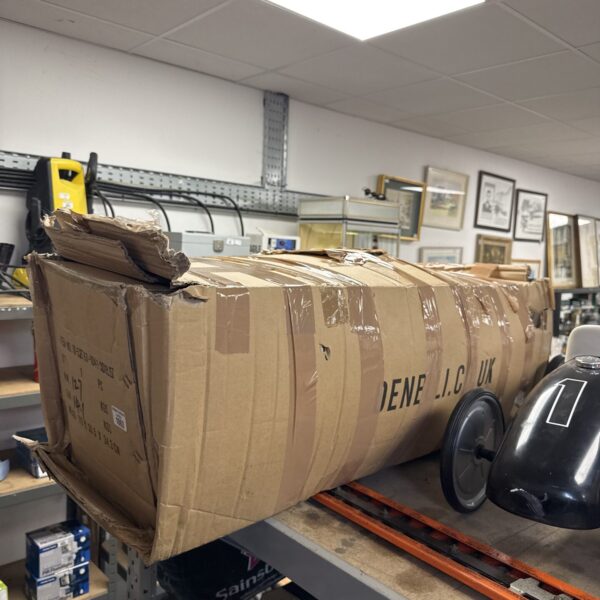 Boxed artificial Christmas tree ready for holiday decorating.