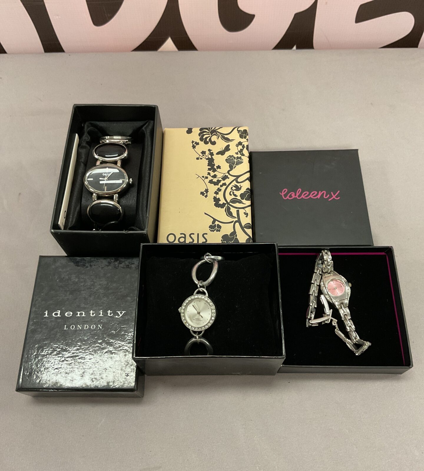 Boxed ladies watch lot including oasis and identity brands.