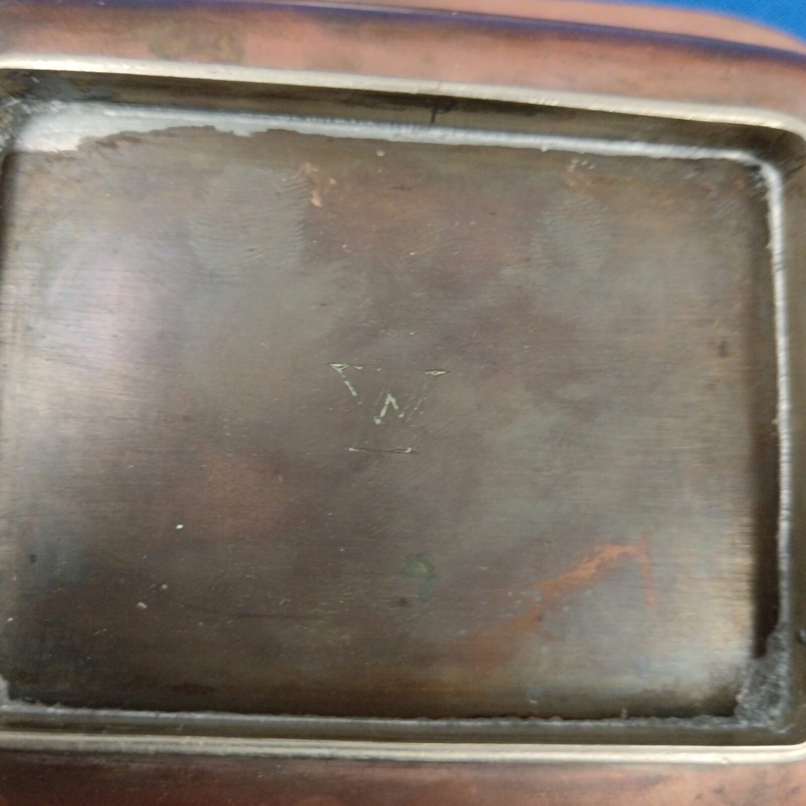 Close-up of the brass fireplace companion set in the lot.