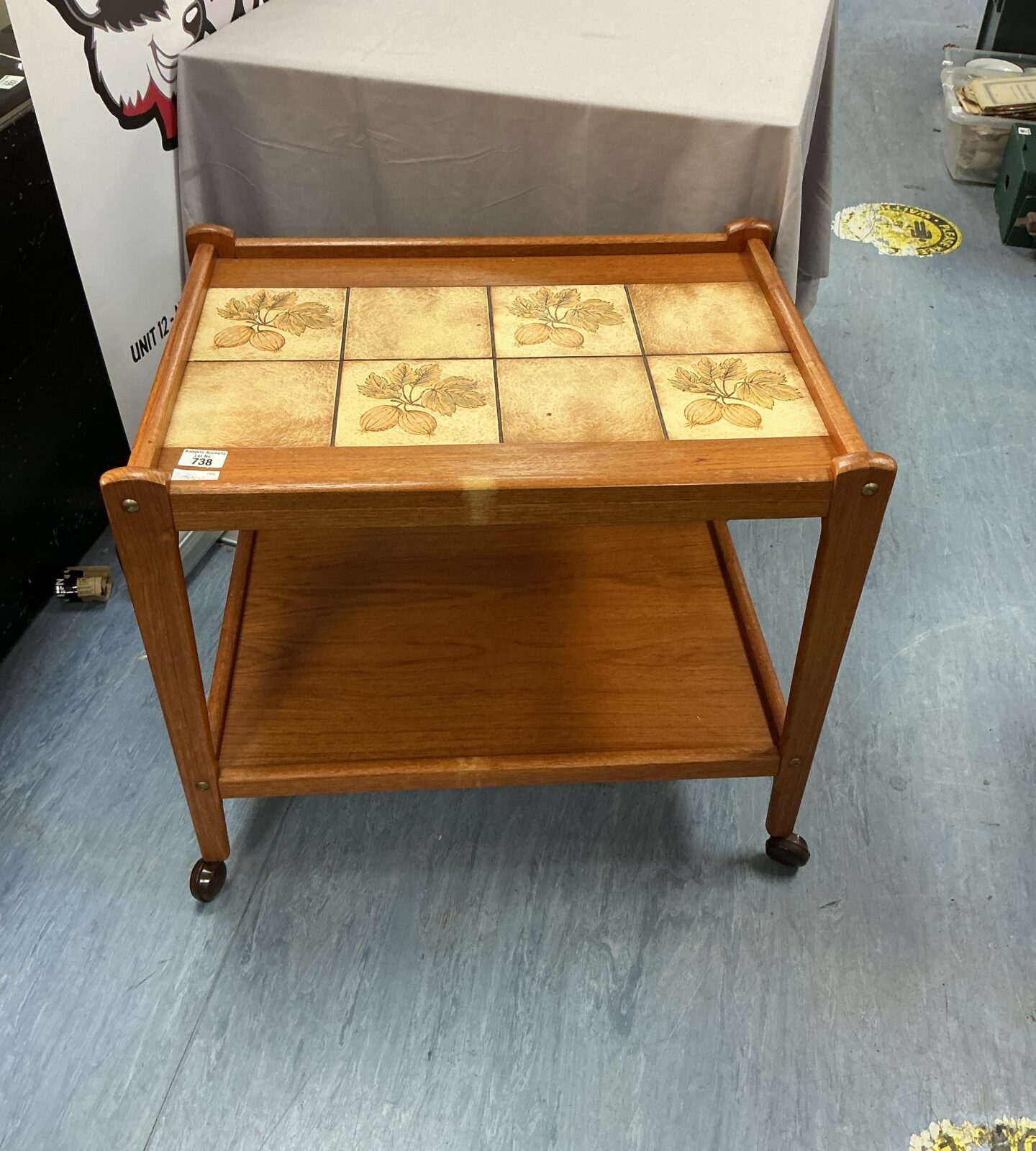 Vintage BRDR Furbo teak trolley with tiled top, side view.