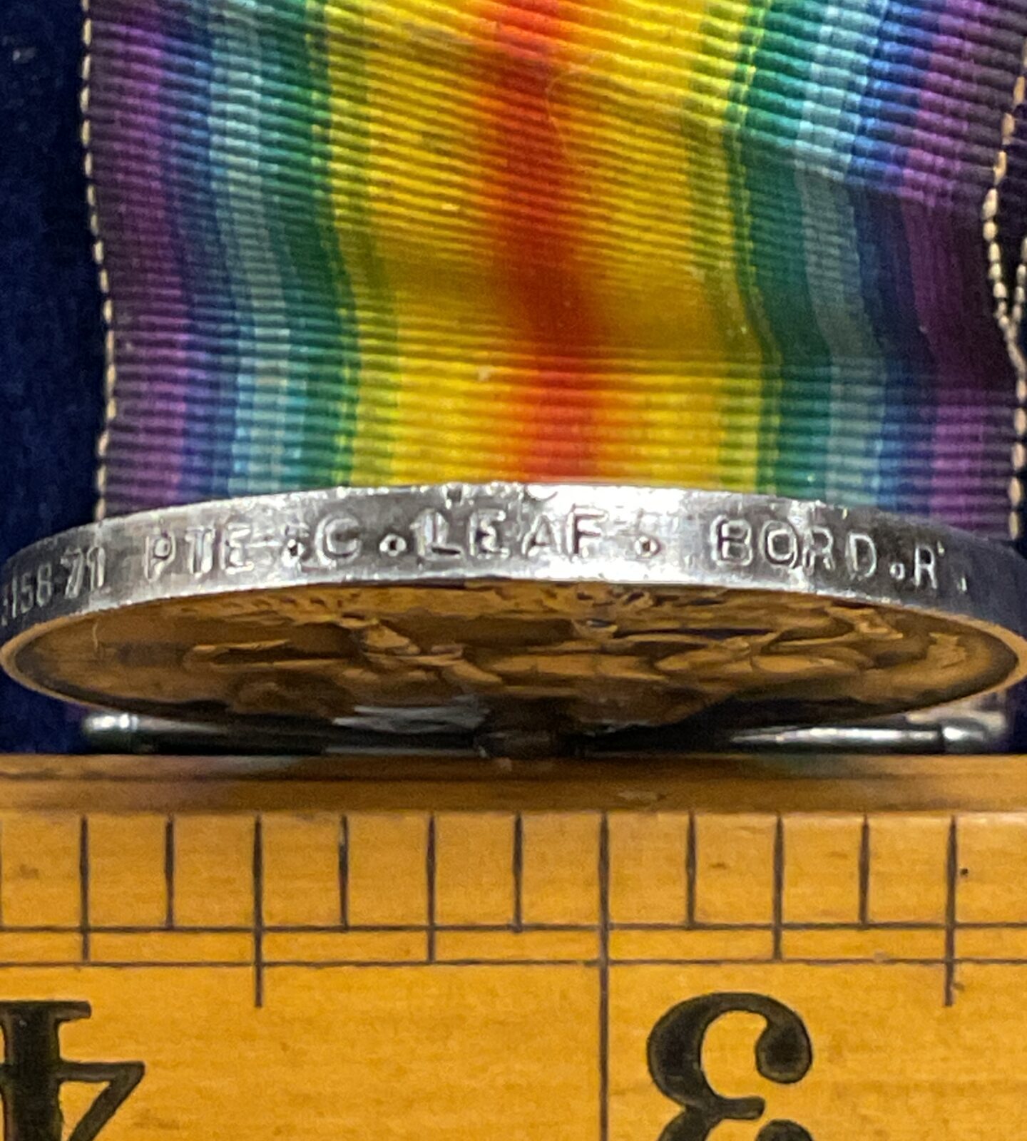Back of British War Medal 1914-1918 with ribbon detail.