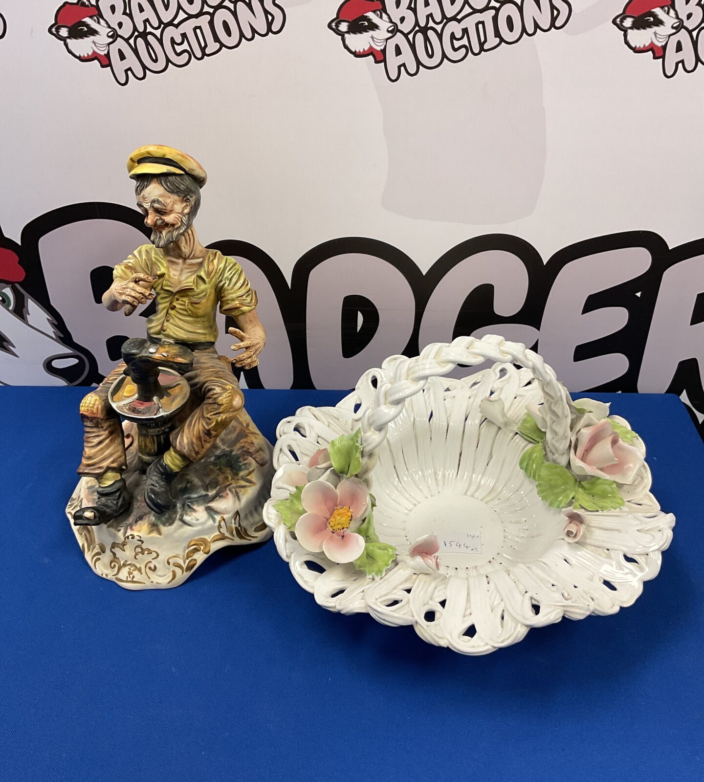 Vintage Capodimonte figurine and floral fruit bowl, detailed Italian porcelain.