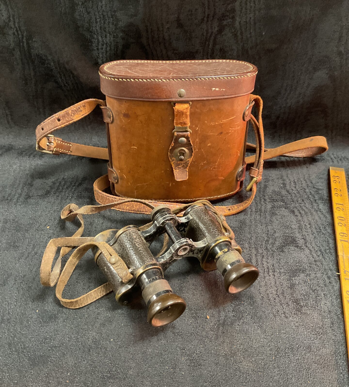Vintage Carl Zeiss binoculars in leather case, WWI era.