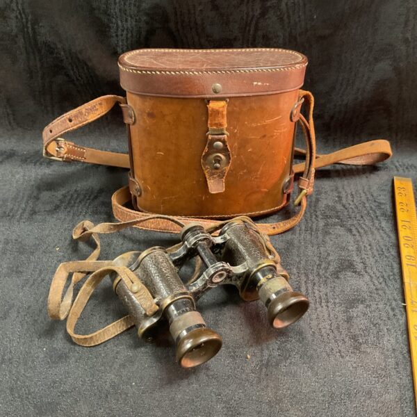 Vintage Carl Zeiss binoculars in leather case, WWI era.