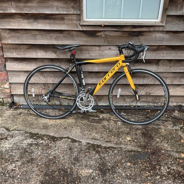 Yellow Carrera TDF road bike for auction.