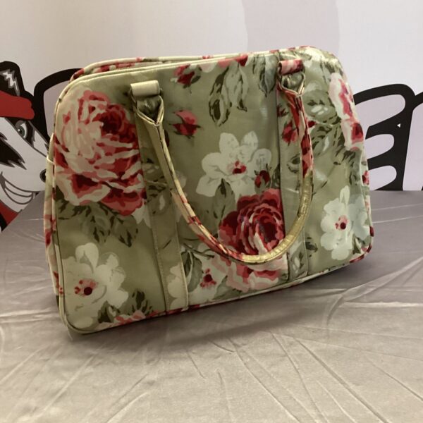 Vibrant Cath Kidston floral handbag with colourful pattern and carrying handles.