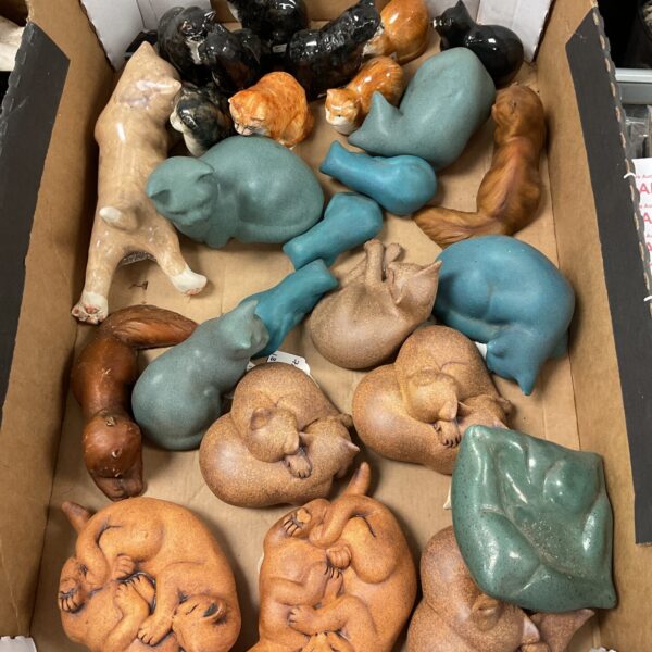 Large collection of vintage ceramic cat figures in various colours.