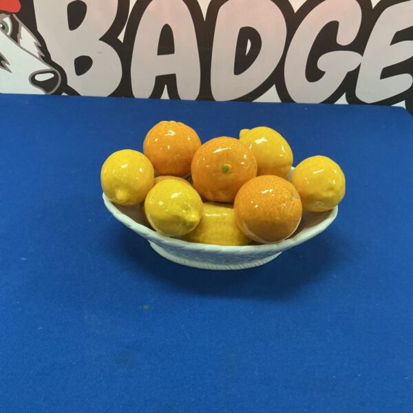 Vibrant ceramic fruit bowl, a charming kitchen centerpiece.