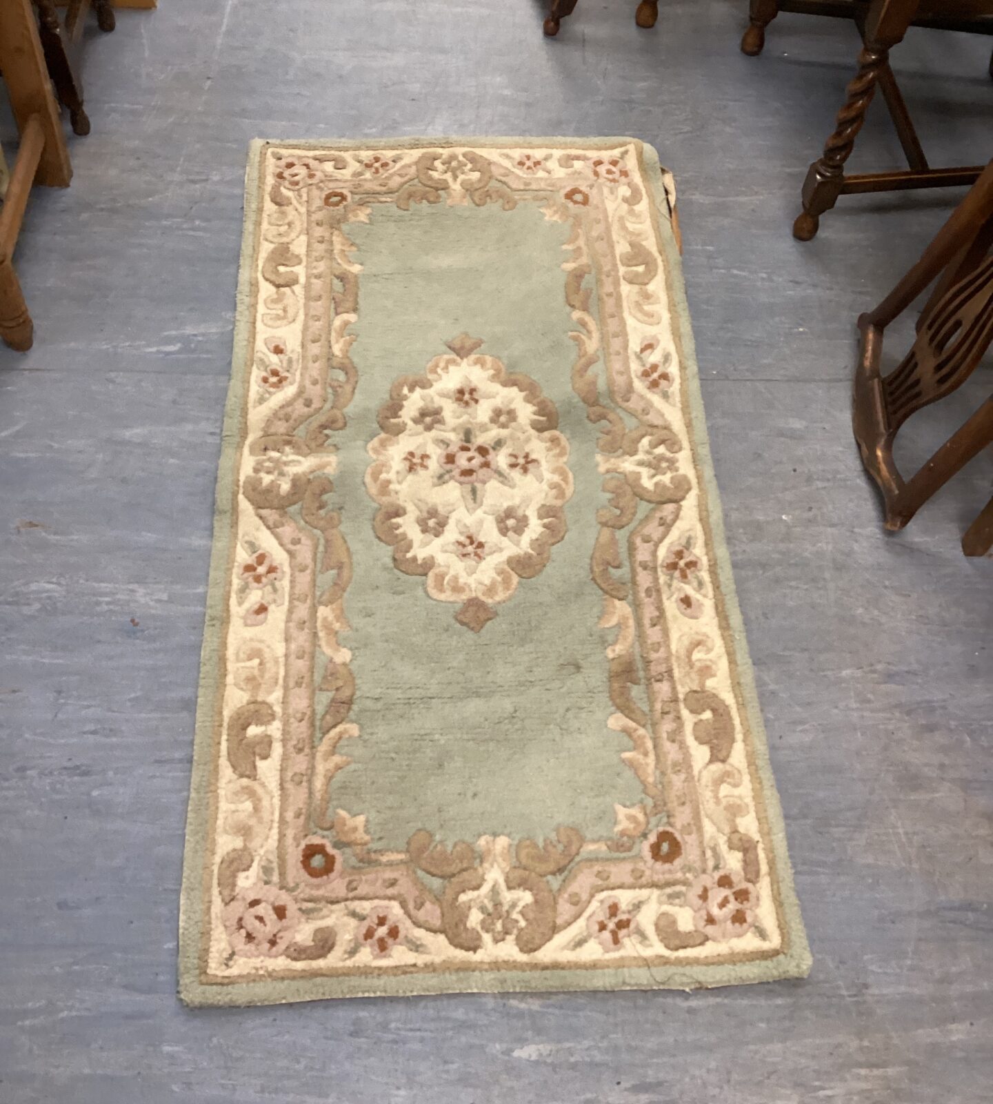 Green Chez-toi Shensi Dynasty wool rug with intricate design.