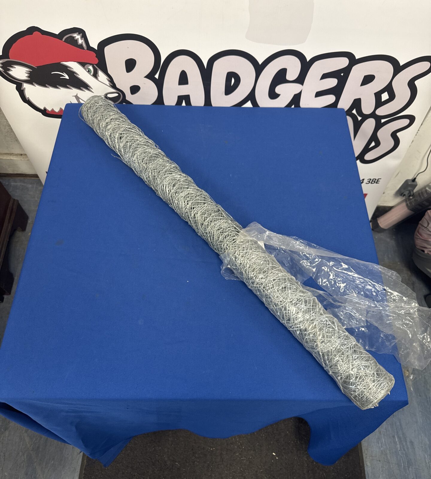 Galvanized steel chicken wire roll for garden and poultry fencing.