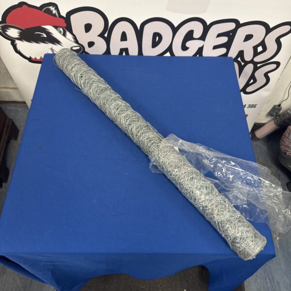 Galvanized steel chicken wire roll for garden and poultry fencing.