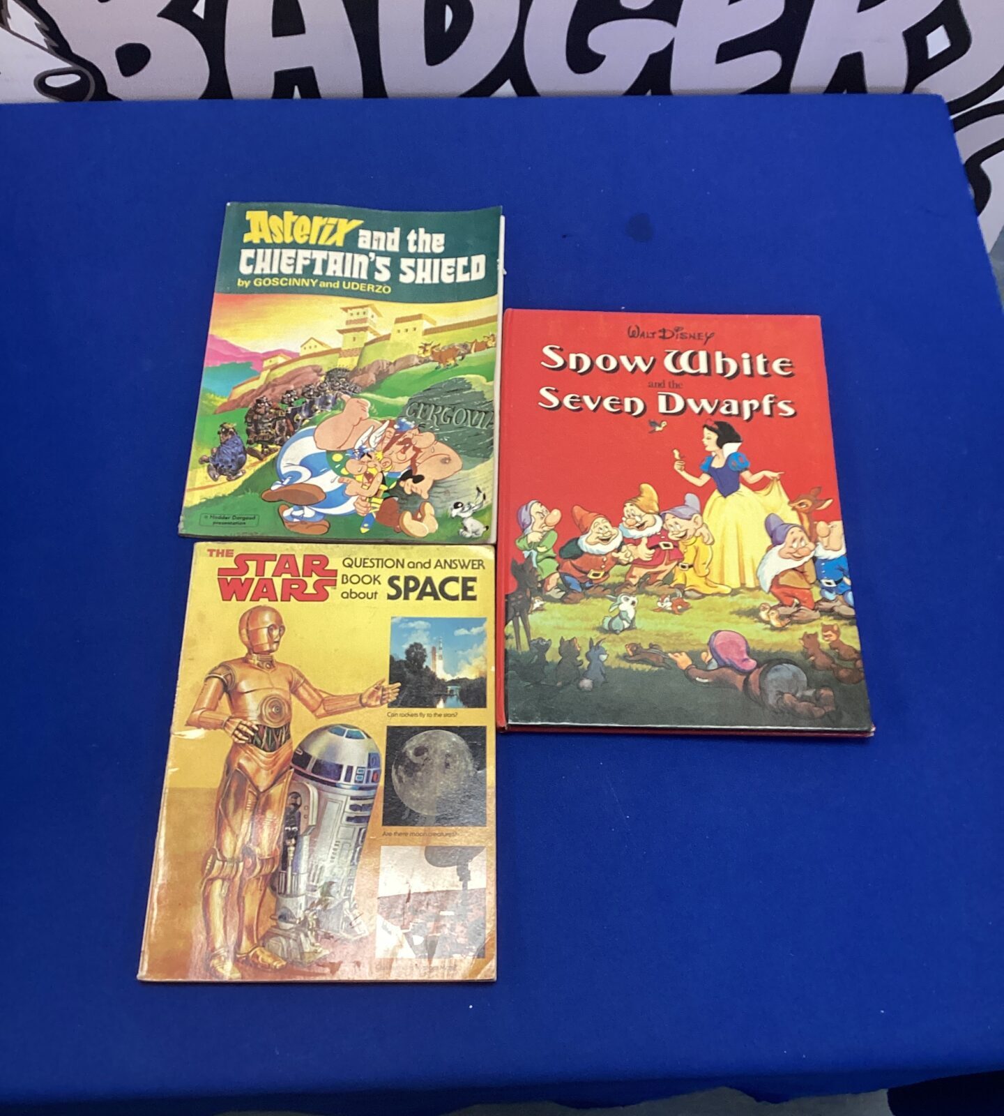 Vintage children's story books lot including Snow White, Star Wars, and Asterix.