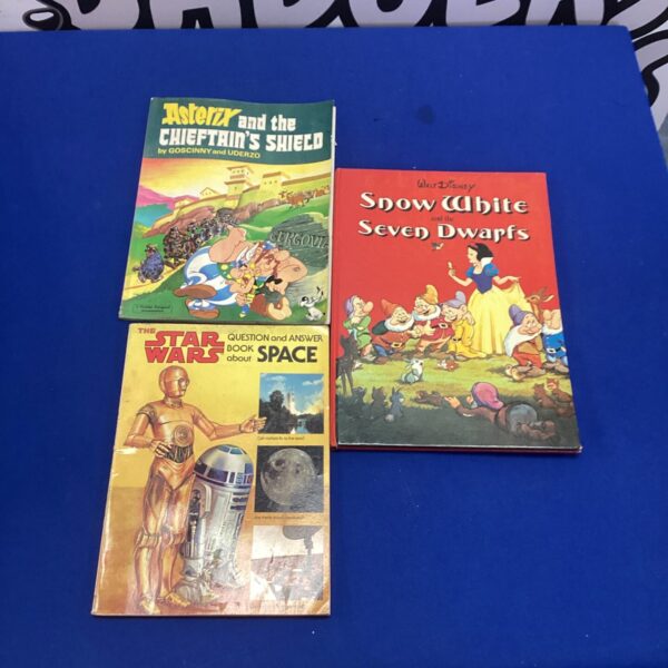 Vintage children's story books lot including Snow White, Star Wars, and Asterix.