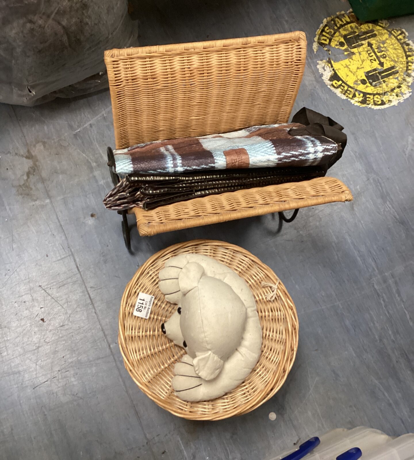 Vintage child's wicker wash bin set with magazine rack and bags.
