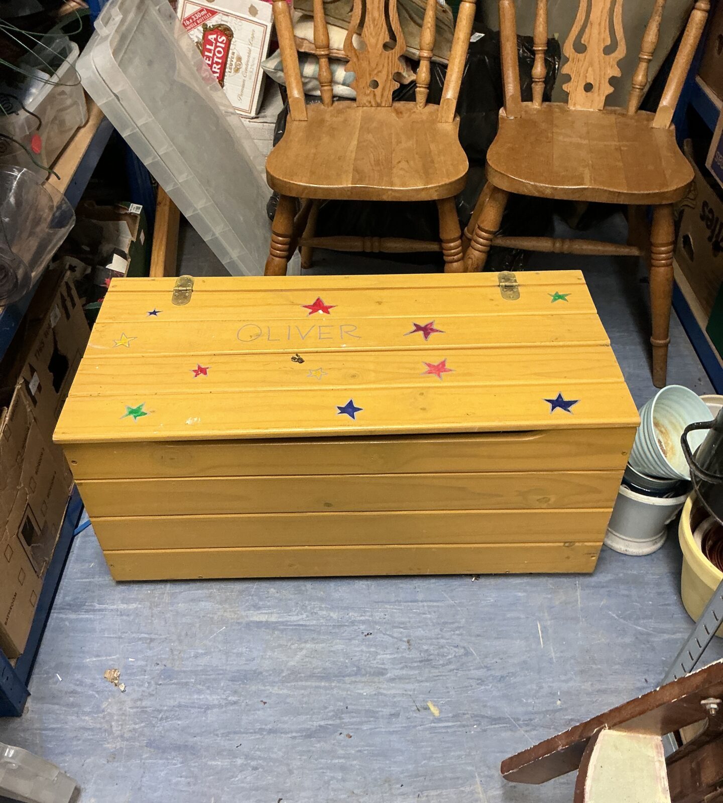 Vintage wooden child’s storage chest for toys and nursery decor.