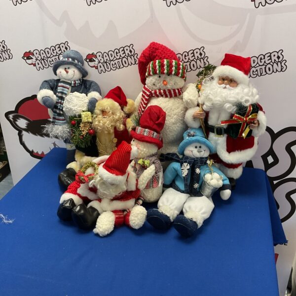 A colourful lot of Christmas soft toys and decorations.