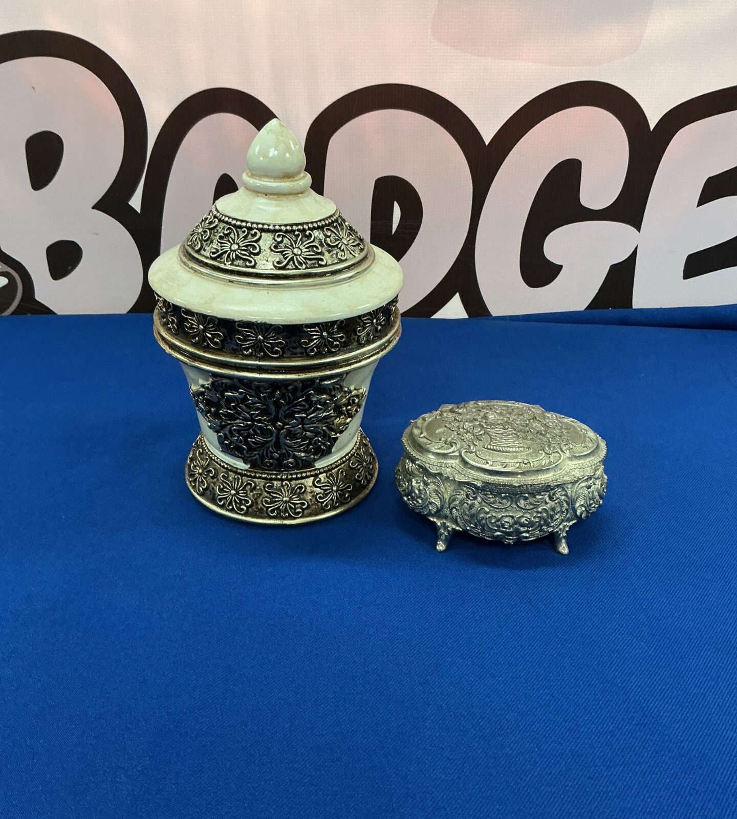 Vintage cinnabar style pewter trinket box with intricate detailing.