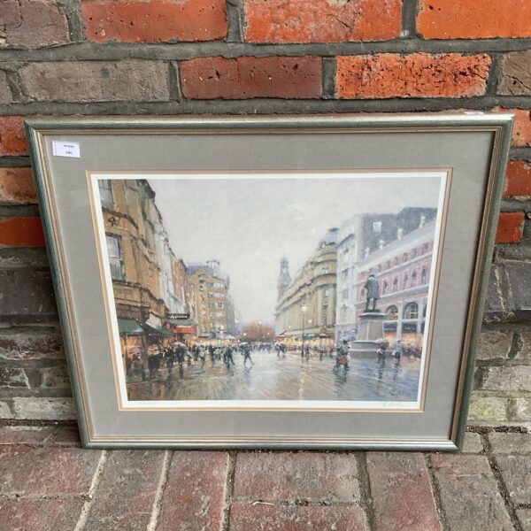 Signed limited edition cityscape print of a rainy street scene.