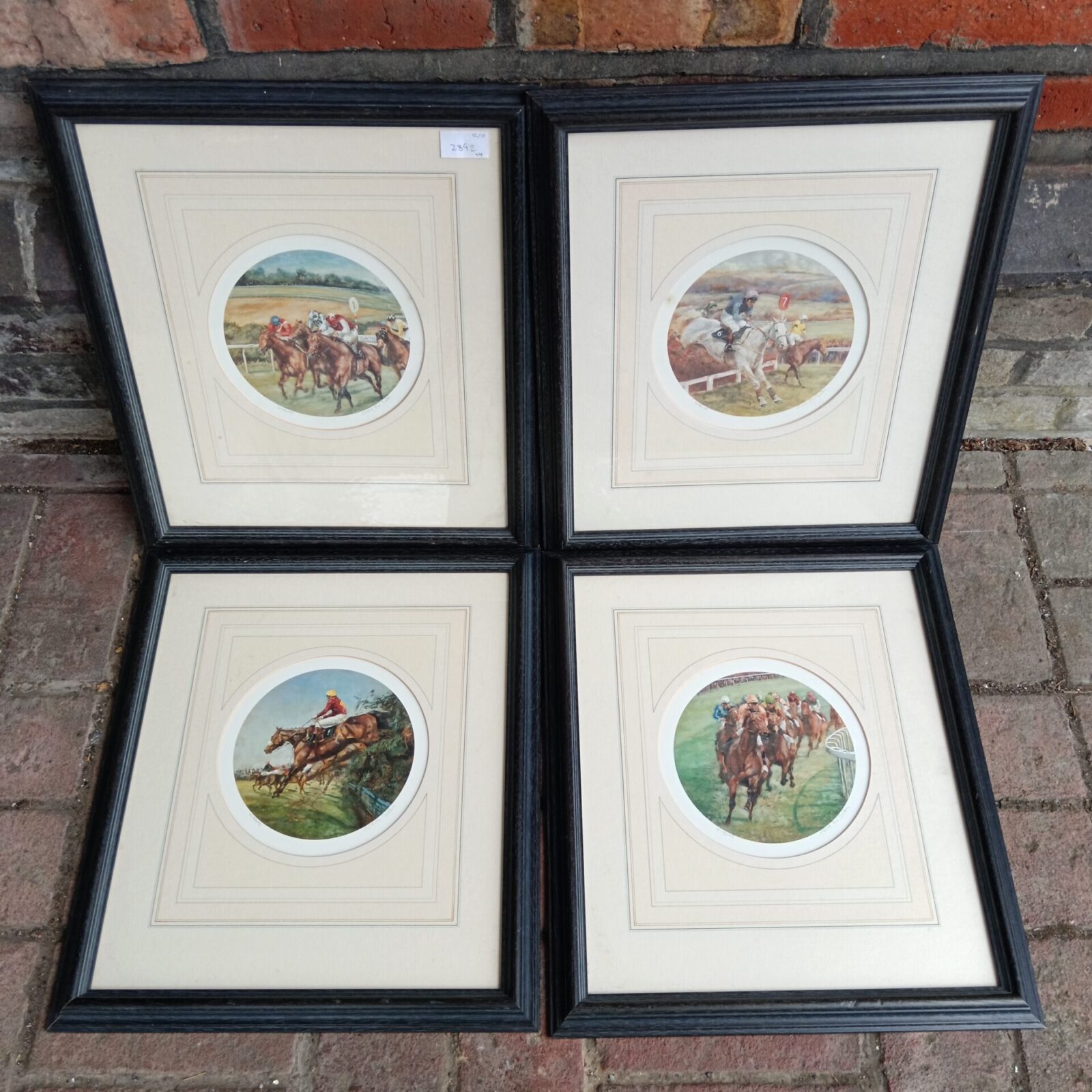 Set of four limited edition Claire Eva Burton horse racing prints.