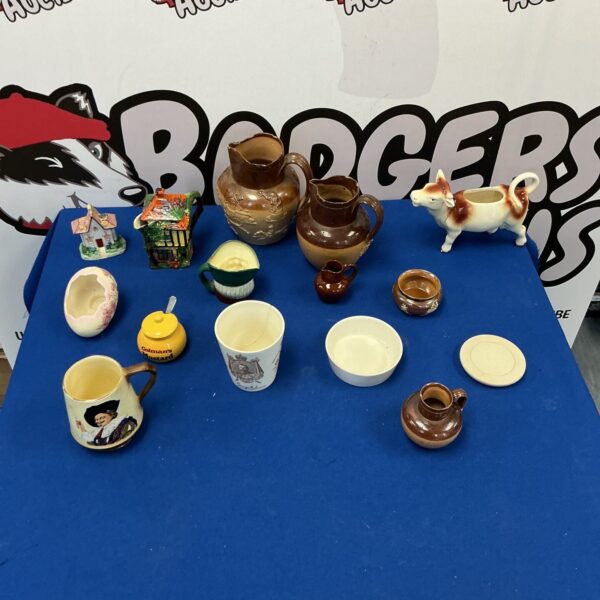 Vintage Colmans Mustard jar with other ceramic collectibles.