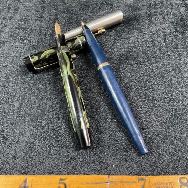 Vintage Conway Stewart and Parker fountain pen set with gold nibs.