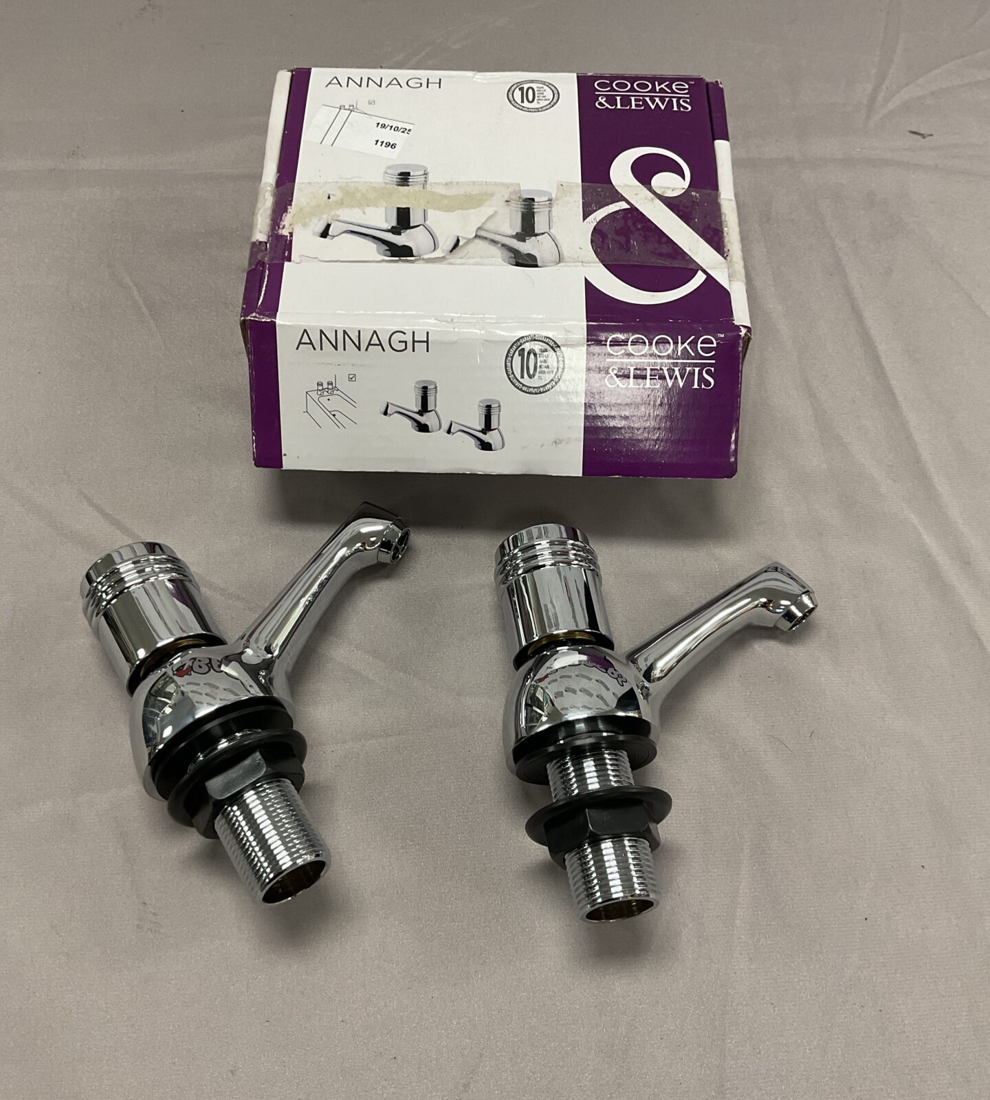 New Cooke & Lewis Annagh basin taps in original packaging.