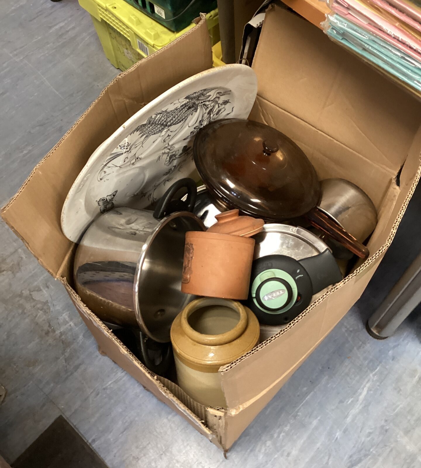 Vintage cooking pots and pans lot in a cardboard box.