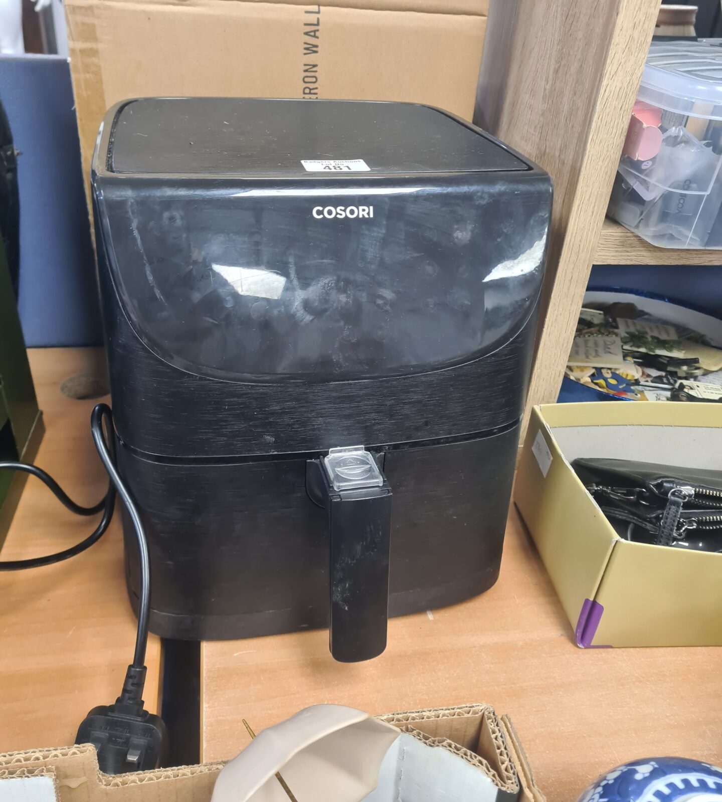 Black Cosori air fryer, a modern kitchen appliance for healthy cooking.