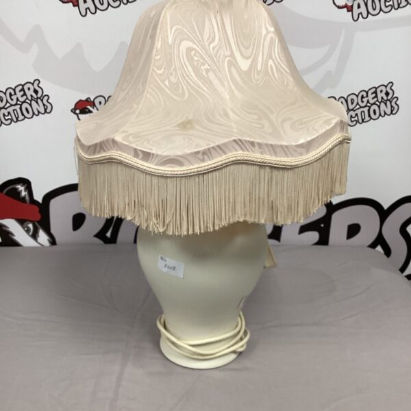 Vintage cream table lamp with fabric shade.