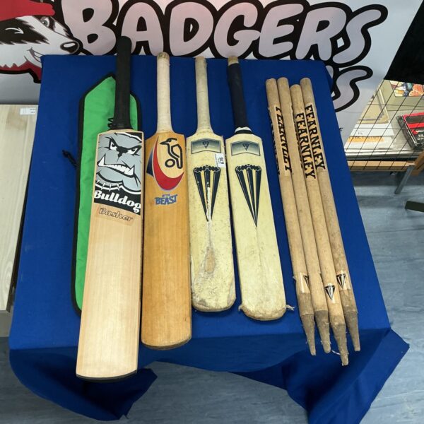 Cricket bats and stumps lot including Bulldog Basher bat.