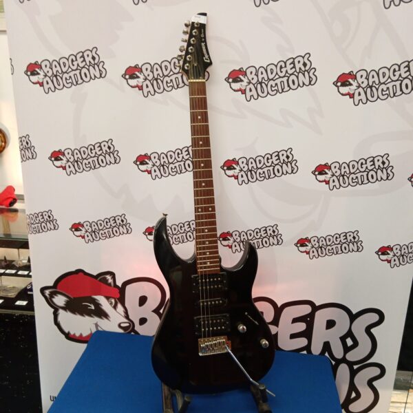 Black Cruiser electric guitar, six-string musical instrument.