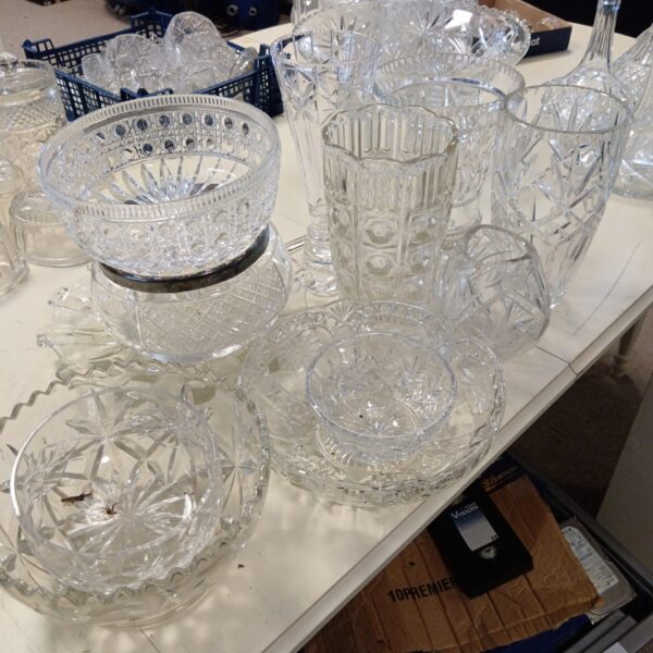 Large lot of vintage crystal and cut glass bowls and vases.