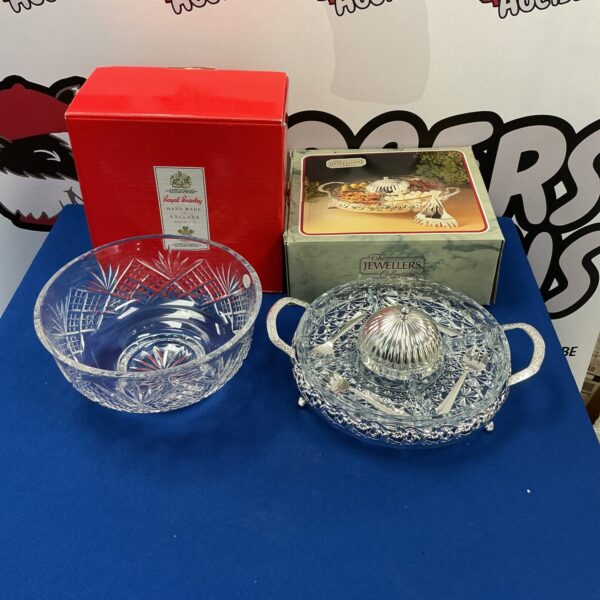 Vintage crystal salad bowl with silver plate stand for serving.
