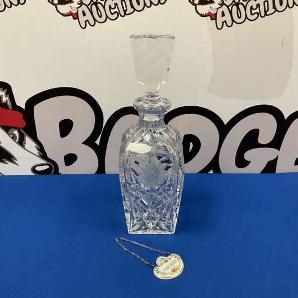Vintage crystal decanter with sunflower design and Staffordshire plaque.